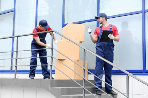 Professional movers handling furniture in Bermondsey