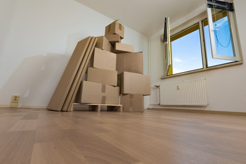 Professional house removalists loading boxes in Bermondsey