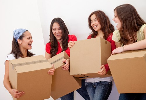 Packing boxes and furniture loaded into a Bermondsey removal van