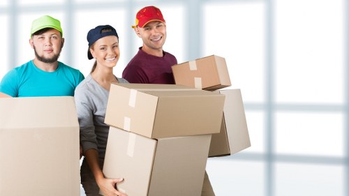 Local Bermondsey student removals team navigating a flat move