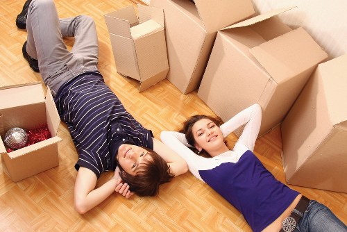 Packing boxes neatly for home removals in Bermondsey